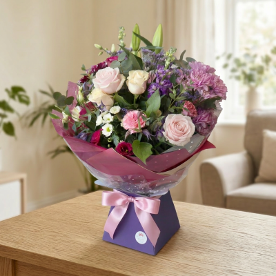 Cool Breeze - This classical stylish collection of flowers, make this hand tied the perfect gift. Flowers professionally arranged and delivered by a local florist.